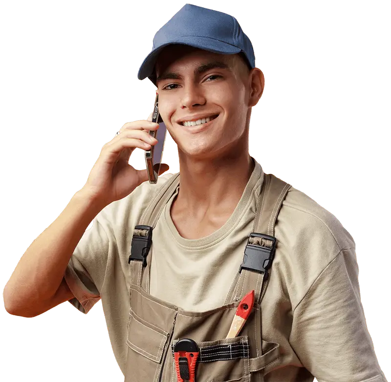 young builder talking on a mobile phone
